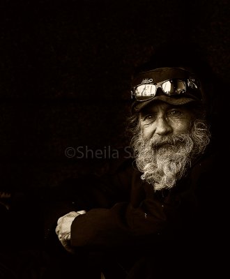 Homeless man with spectacles 