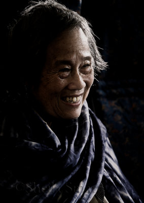 Tibetan lady on ferry