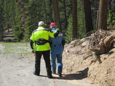 Bob and Doug carrying Jim's ashes