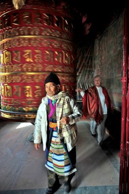Visitors turn the prayer wheel at Swayambhunath Stupa