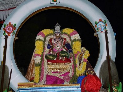Mylapore - Madhavaperumal devashanam - Peyazhwar doing gnyanopadesam to thirumazhisai piran.jpg