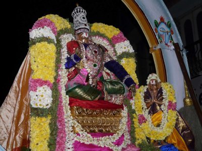 Mylapore - Madhavaperumal devashanam - Peyazhwar doing gnyanopadesam to thirumazhisai piran2.jpg