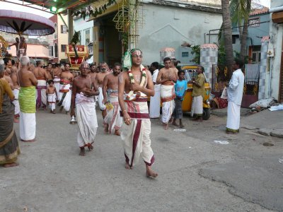 1st day periya murai parthasarathi bhattar beginning the rituals of brahmotsavam.JPG
