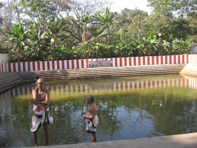 Sri ES Kannan and Madurai AdhyApakar performing rituals - A fitting use for the pushkaraNi.jpg