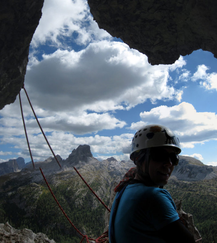 Photomontage - Martina cliff face belay in a cave