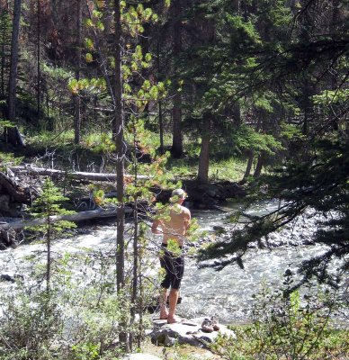 Brian dips in Owen Creek