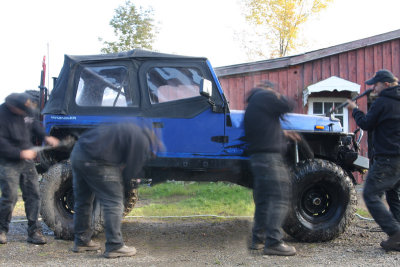 Jerry washing his Jeep