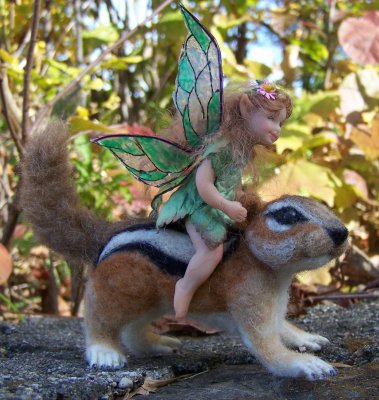 Fairy riding a chipmunk  SOLD