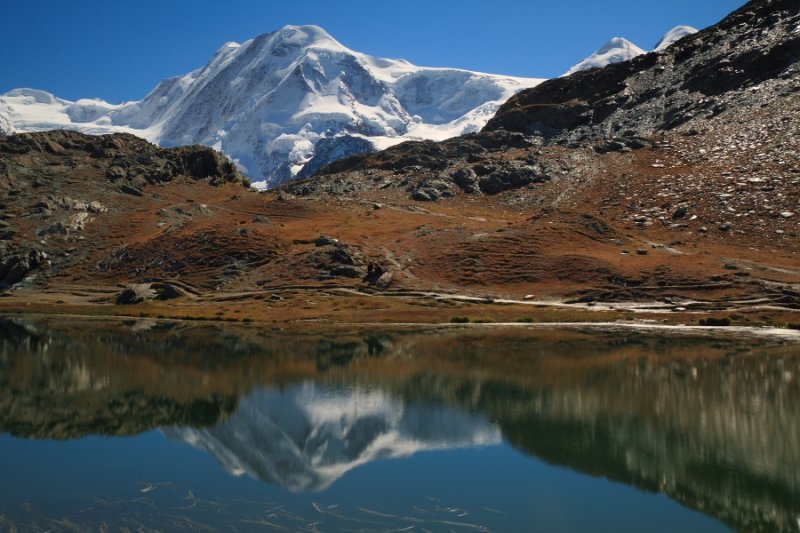 Liskamm (4527m), reflected in the Riffelsee, Rotenboden