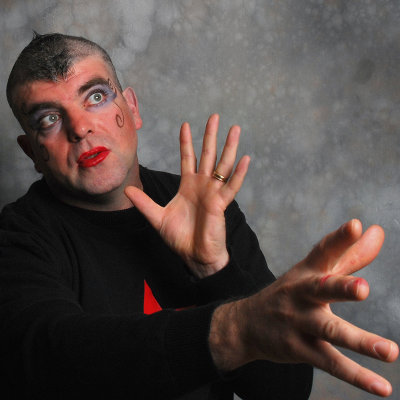 Overly made up pantomime artist