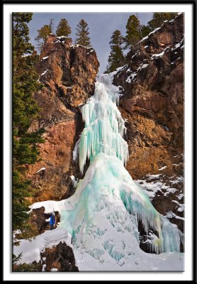 Snowshoer Gazing Upon Frozen Treasure Falls