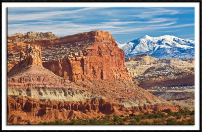 Red Rock and Snow Covered Mountains