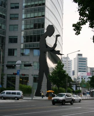 This Sculpture is four stories tall and the hammer arm moves up and down, pretty impressive.