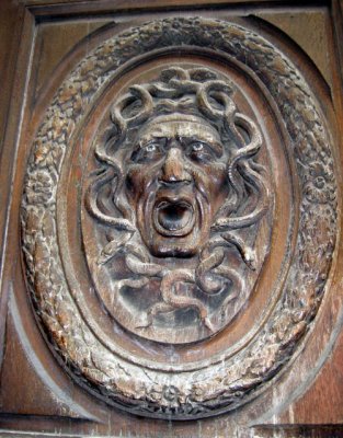 Carving on a door in the Marais