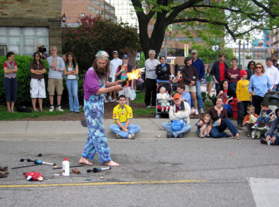 More at the art festival: A juggler playing with fire