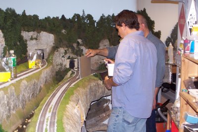 Using cardboard to keep hairspray off the rails