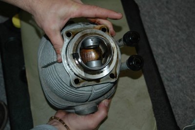 Remove jug with piston in cylinder.