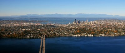 Seattle with floating bridge and Olympics