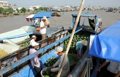 buying watermelon in other boat