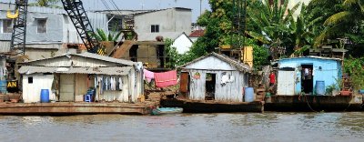 houses on abandoned crane barges