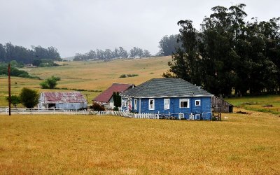 Blue house on the field