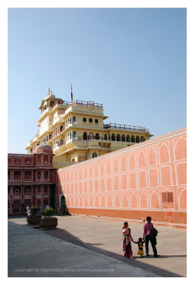 The yellow seven storeyed Chandra Mahal; place for present family