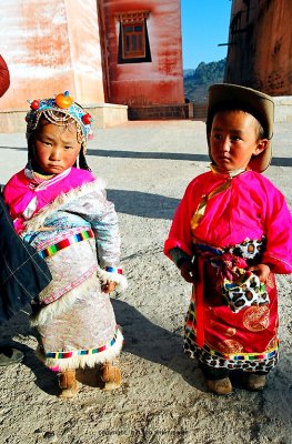 Taking photo  traditional dress kids