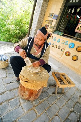 Wood carving with Naxi language; Sourvenir of Dali