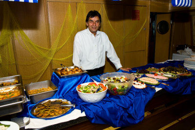 George proudly displays Greek Feast