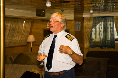 Captain John gives a speech at the Captain's farewell dinner