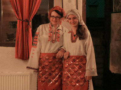 Evgeny's wife and daughter in traditional peasant garb