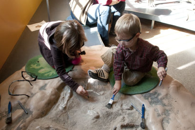 Sylvi and Charlie Digging Bones in the Discovery Center at AMNH