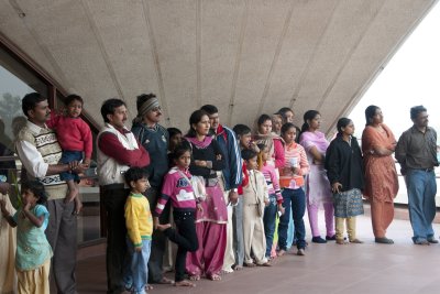 Listening to a presentation on the Baha'i faith at the Lotus Temple