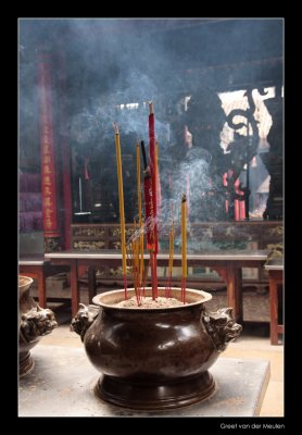 7104 Saigon, burning incense in temple
