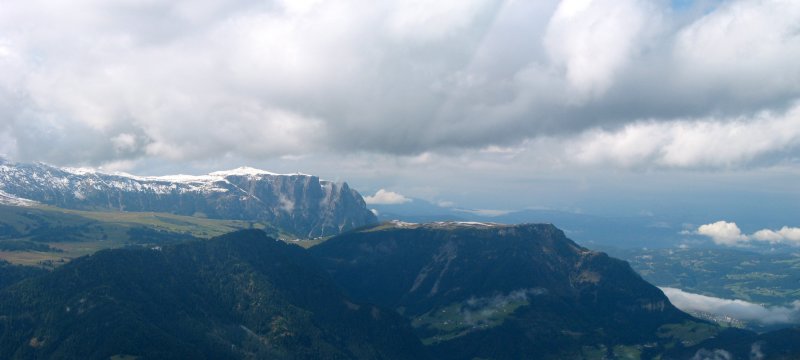 A bus, a gondola, and a cable car get us to Rifugio Seceda (2456m) and this view