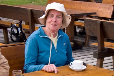 Sue takes a cappuccino break at Rifugio Comici