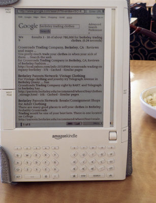Googling with my old Kindle 1 at a restaurant, Nov. 2008