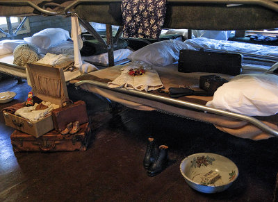 Those on top bunks used the floor space for items also, of course.