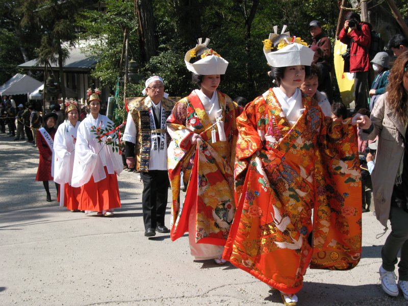 Highly decorated kimono-clad women