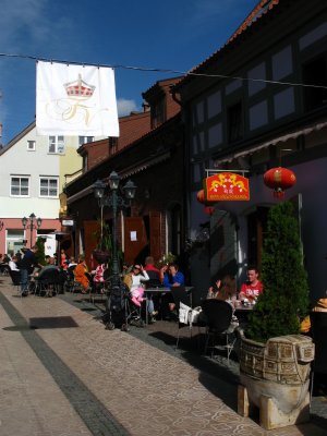 Enjoying the rays at an Old Town street cafe