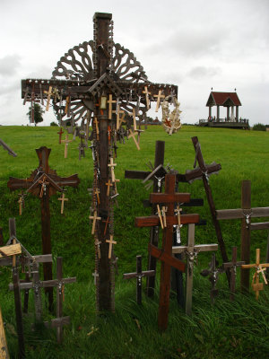 Crucifix-adorned cross