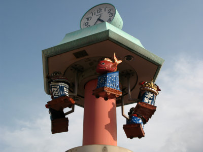 Clock with Kunchi Matsuri float replicas