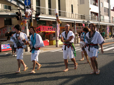 A group of dancers walks up