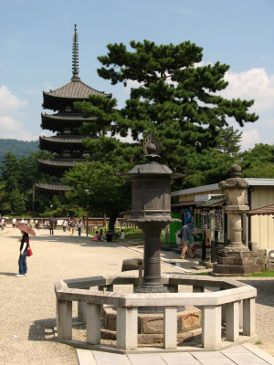 Stone lantern at Nanen-dō with Kōfuku-ji pagoda
