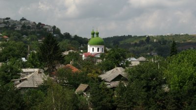 Orthodox church rising over the town