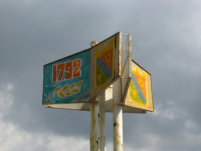 Sign displaying town crest and foundation date