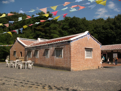 Flags flapping over the Taiwanese farmhouse