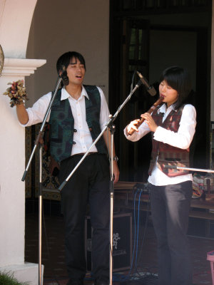 Singer and quena player
