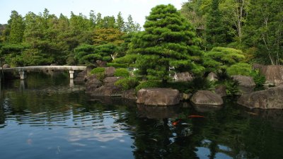 Pond and stone bridge in Oyashiki-no-niwa