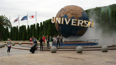 Posing in front of the famous Universal globe